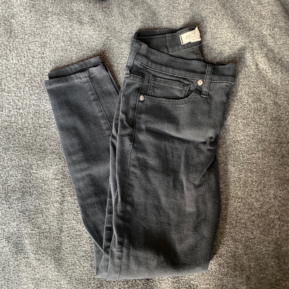Black Madewell mid rise skinny jeans.